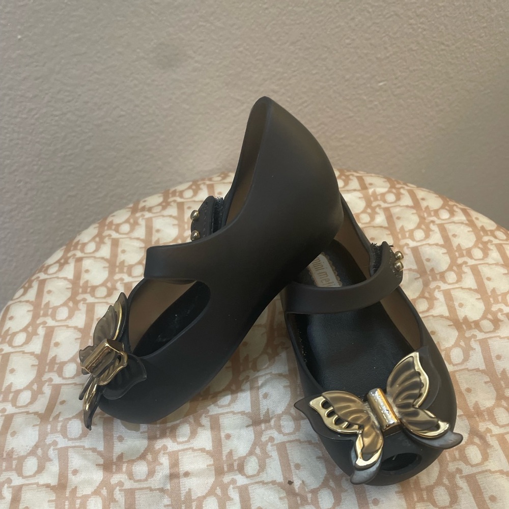 Mini Melissa black slip on. Size 6